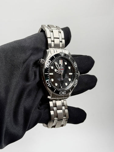 Montre OMEGA - Montre Seamaster Diver 300M 42 mm 210.30.42.20.01.001 BLACK STEEL 58 Facettes JLS