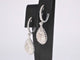 Boucles d'oreilles Boucles d'oreilles en or blanc en forme de larme avec diamants 58 Facettes 2055