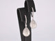 Boucles d'oreilles Boucles d'oreilles en or blanc en forme de larme avec diamants 58 Facettes 2055