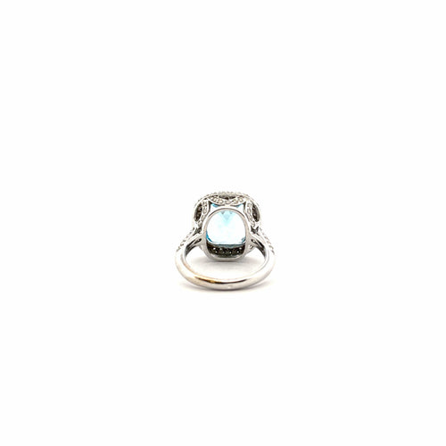 Bague 56 Bague or blanc topaze bleue et diamants 58 Facettes