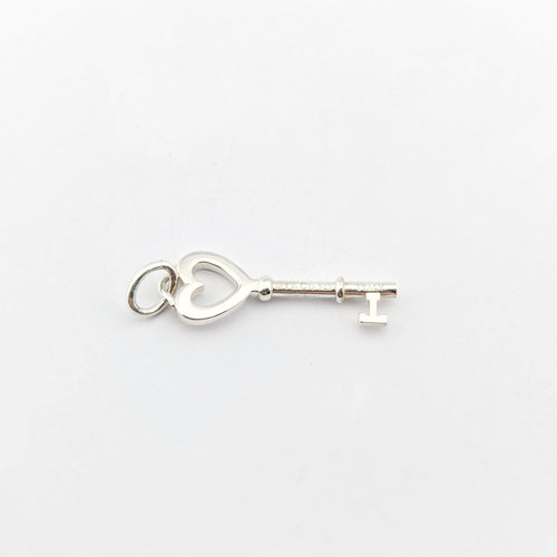 Pendentif Pendentif Tiffany & Co "Return to Tiffany" Clé Coeur en argent 58 Facettes 32310