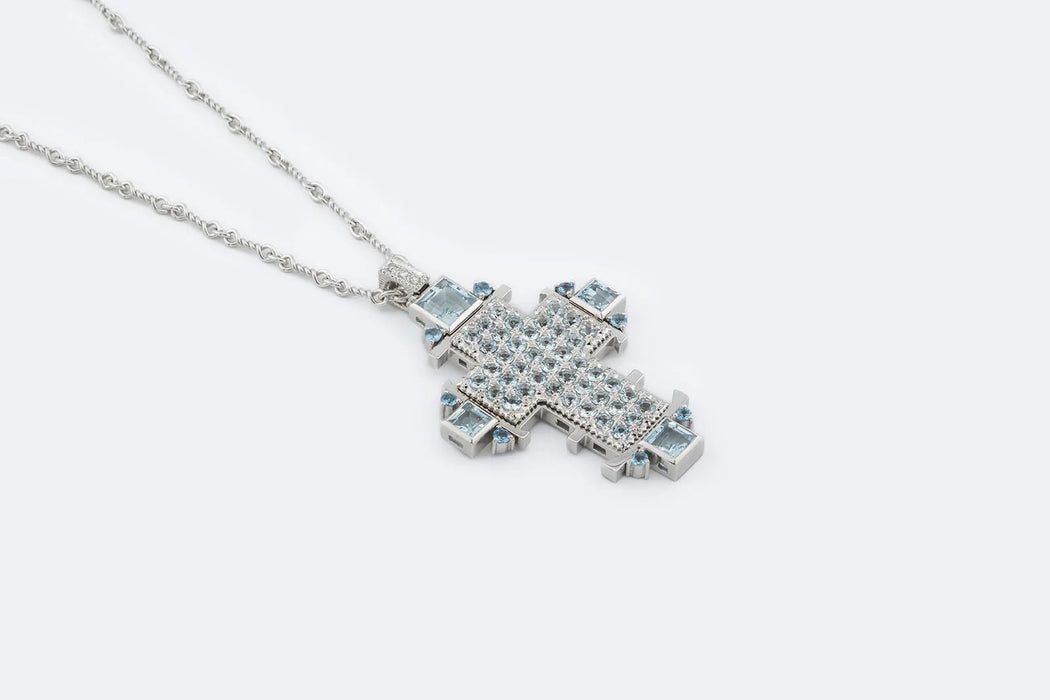 Crucifix necklace in white gold, diamonds and aquamarine