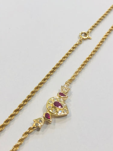 Collier Collier or jaune, rubis et diamants maille corde 58 Facettes