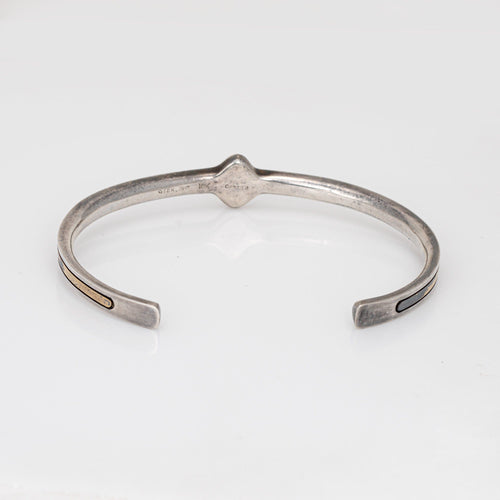 Bracelet Bracelet manchette Cartier des années 70 en argent sterling et or 18 carats, logo CC vintage signé 58 Facettes G13936