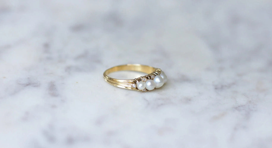 Bague 53 Bague jarretière perles et diamants 58 Facettes