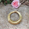 Broche VAN CLEEF & ARPELS Clip « Cercle », or 18k 58 Facettes 58