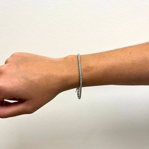 Bracelet Bracelet Rivière en or blanc et diamants 58 Facettes D363130CG