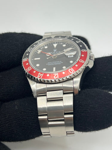 Montre Rolex GMT MASTER II « Coke » 58 Facettes