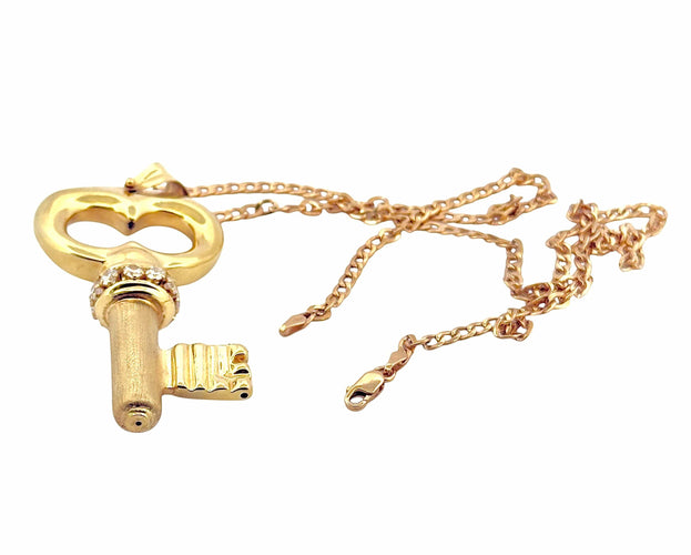 Collier Chaîne et pendentif clé porte bonheur en or jaune 18 carats 58 Facettes