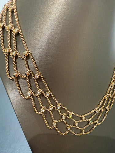 Collier Chopard - Collier drapier « collection les chaînes » - Or jaune et diamants 58 Facettes 1.0000813/1