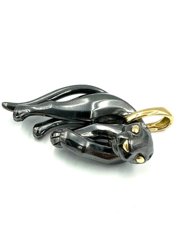 Pendentif CARTIER. Collection "Panthère", pendentif or jaune et silverium 58 Facettes