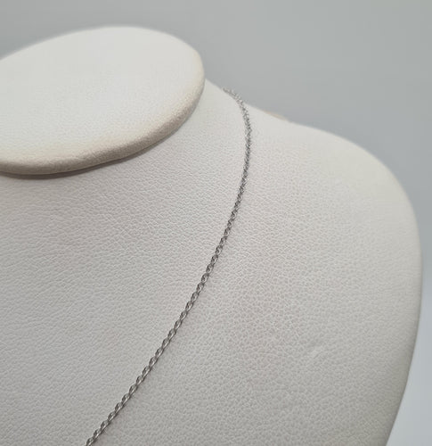 Collier Collier or blanc serti d’un pendentif HAI en diamants 58 Facettes