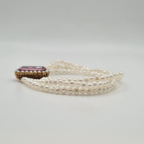 Bracelet Bracelet or rose 18 carats serti de perles fines et pierre rose 58 Facettes