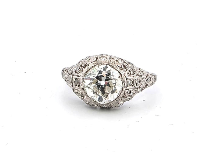 Bague 55 Bague Art Déco en platine avec un diamant central de 2,50 carats de taille ancienne. 58 Facettes