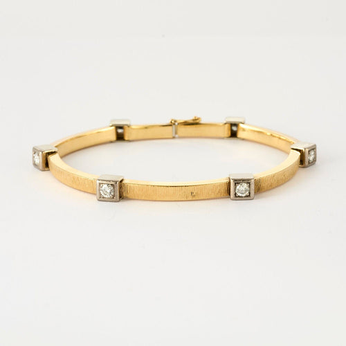 Bracelet Bracelet moderniste en or jaune et gris, et diamants 58 Facettes MEA43045