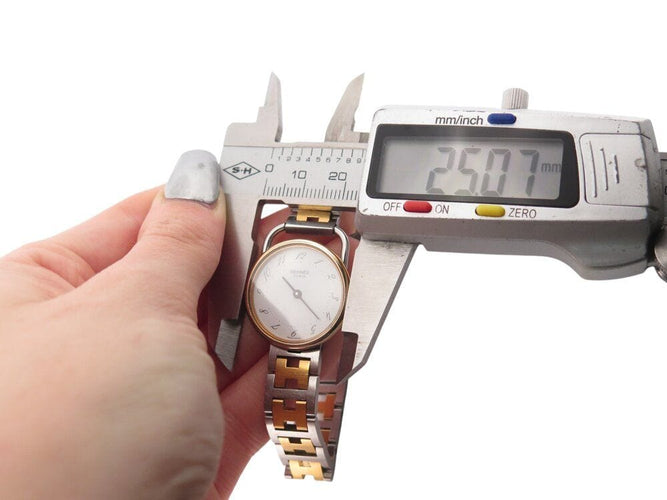 Montre vintage montre HERMES arceau 25 mm acier et plaque or quartz  plated 58 Facettes 268618