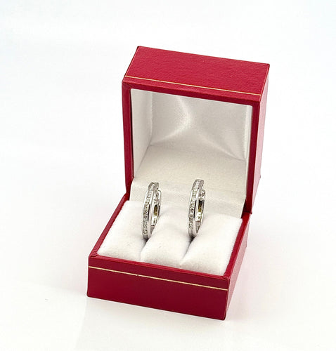 Créole en diamants , or blanc 18 carats 58 Facettes