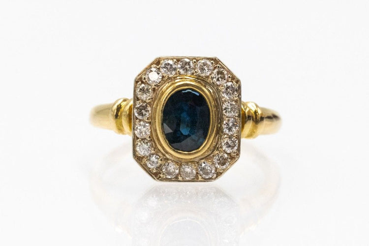 Bague 59 Bague géométrique en or ornée de saphirs et de diamants. 58 Facettes 11260