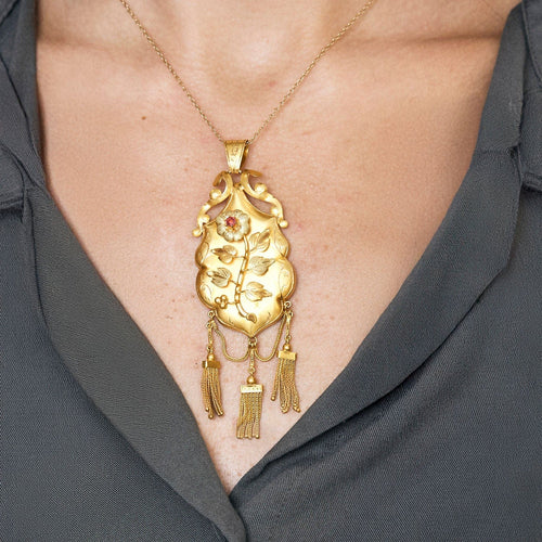 Pendentif Pendentif porte souvenir en or jaune 58 Facettes HOU5531