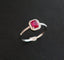 Bague 54 Bague sertie d'un Rubis, entourage Diamants 58 Facettes