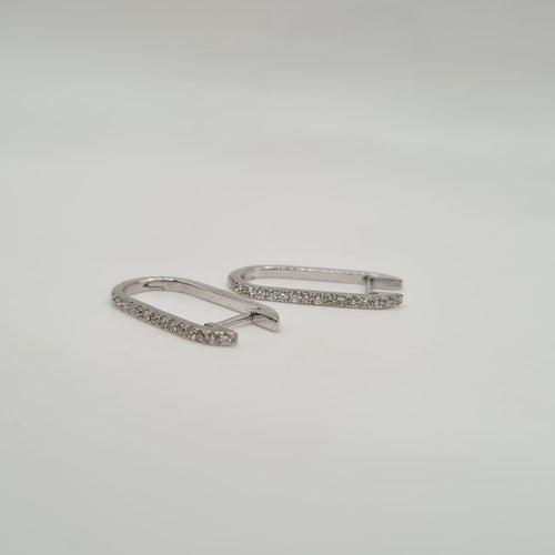 Boucles d'oreilles Créoles or blanc 18 carats serties diamants naturels 58 Facettes