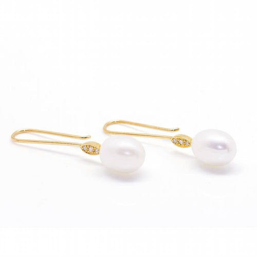 Boucles d'oreilles Boucles d'oreilles avec perle ovale et diamant 58 Facettes D360904FV