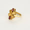 Elegancki pierścionek koktajlowy z żółtego złota, cytrynami i turmalinami 
