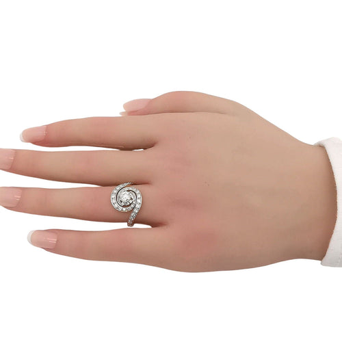 Bague 54 Bague tourbillon or, platine & diamants 58 Facettes