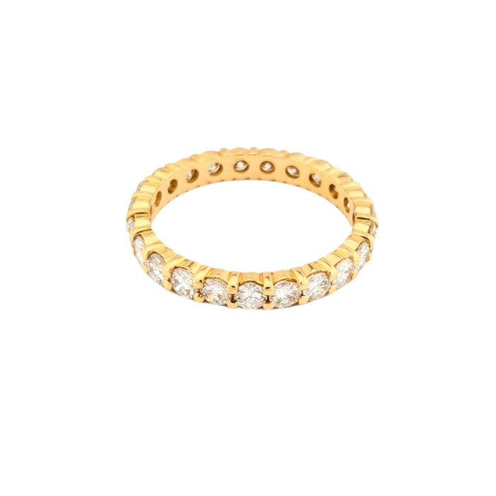 Anillo de matrimonio círculo completo de diamantes de oro amarillo