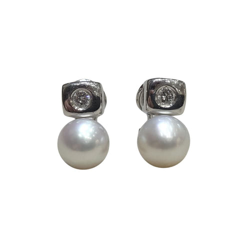 Boucles d'oreilles Boucles d'oreilles en or blanc avec perles et brillants 58 Facettes T102