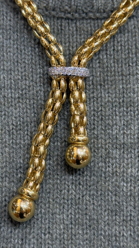 Collier Collier maille Popcorn à pompons en or 18 carats 58 Facettes