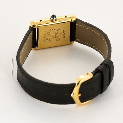 Montre CARTIER - Montre Tank Must en argent plaqué or, cadran blanc chiffres romains 58 Facettes