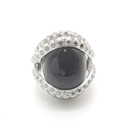 Bague 54 Bague or blanc, onyx & diamants 58 Facettes