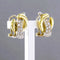 Boucles d'oreilles Boucles d'oreilles bicolores en or serties de diamants taille brillant 58 Facettes