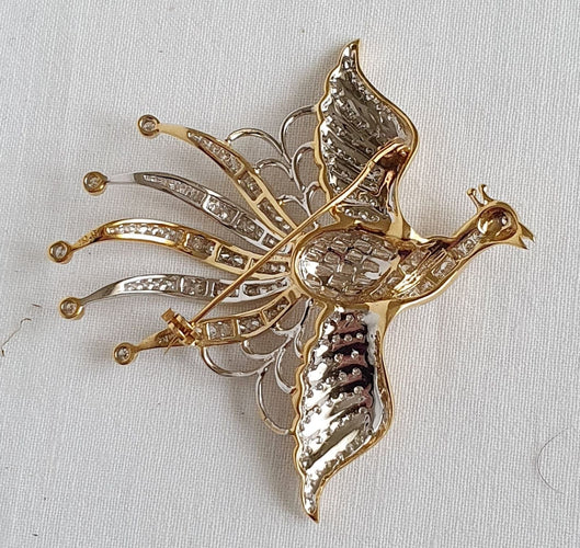 Broche Broche OISEAU DE PARADIS or jaune diamants 58 Facettes R 1137  MKEE