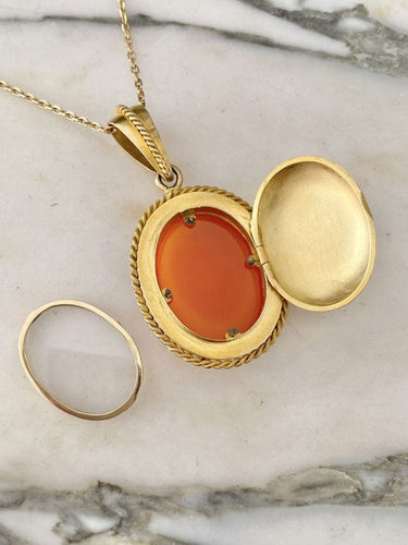 Pendentif Pendentif porte-photo en or jaune serti d'un camée en Agate 58 Facettes