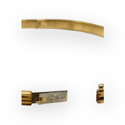 Oval bangle bracelet with opening in 18k yellow gold and sapphire, diamonds 