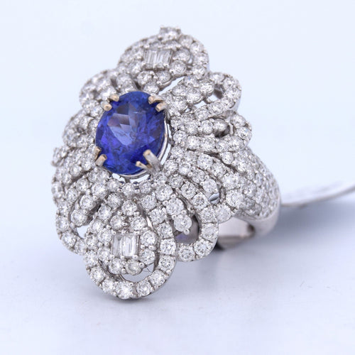 Bague 54 Bague en or blanc avec tanzanite et diamants 58 Facettes