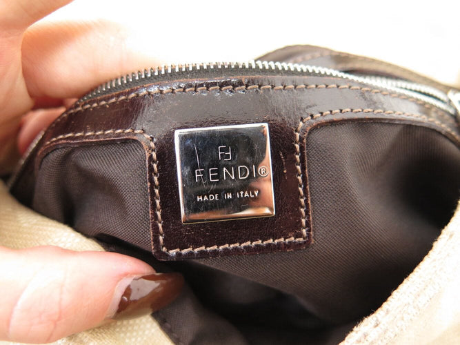 sac a main FENDI baguette en toile jacquard ff zucca beige 26424 hand bag 58 Facettes 270643