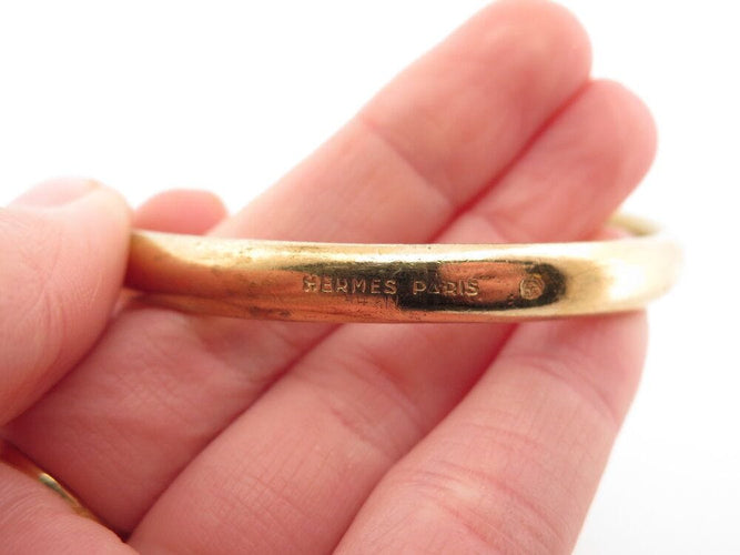 Bracelet vintage bracelet HERMES galop 2 tetes de chevaux ravinet d'enfert plaque or 58 Facettes 267396