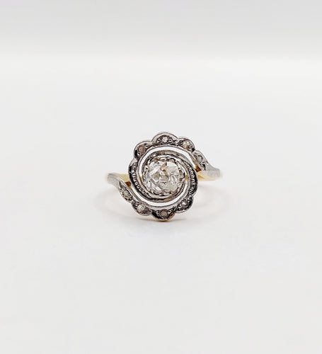 Bague 43 Bague tourbillon antique en or 18k et platine, diamant ancien 0,30 ct et roses 58 Facettes A06352