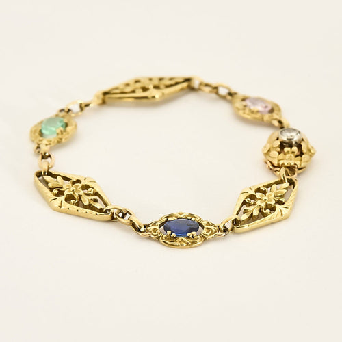 Bracelet Bracelet en or jaune, saphir, topaze rose, émeraude et diamant 58 Facettes PER1612
