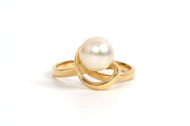 Bague 51 Bague Années 70 en or jaune 18 carats sertie d'une perle 58 Facettes 21857