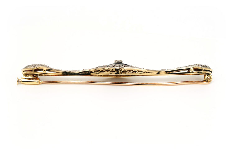 Broche Broche Art Déco sertie d’onyx, saphirs et diamants en or jaune et blanc 18 carats 58 Facettes 23114