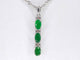 Pendentif White gold pendant with diamonds and emerald 58 Facettes 2140