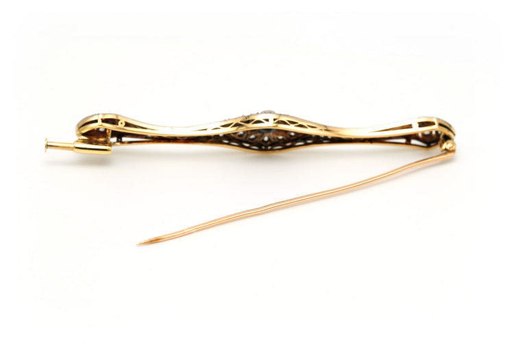 Broche Broche Art Déco sertie d’onyx, saphirs et diamants en or jaune et blanc 18 carats 58 Facettes 23114