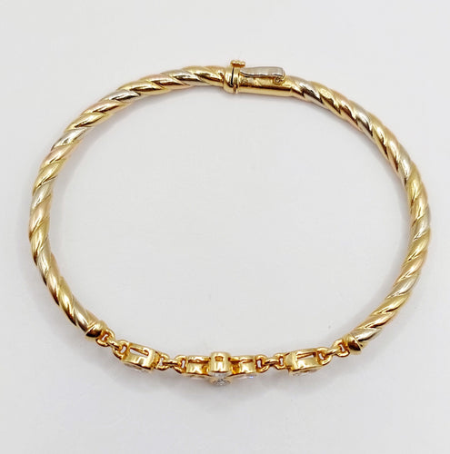 Bracelet Bracelet art déco trois or jaune torsadé et diamants 58 Facettes A05734