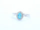 White gold ring with a blue topaz and natural diamonds 58 Facettes 2367