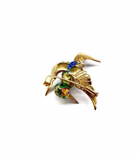 Broche Broche oiseau en or jaune 18K et platine, diamants, rubis, émail 58 Facettes 250002