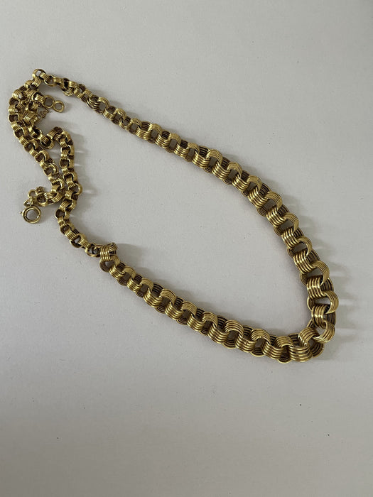 Yellow gold necklace with falling rings